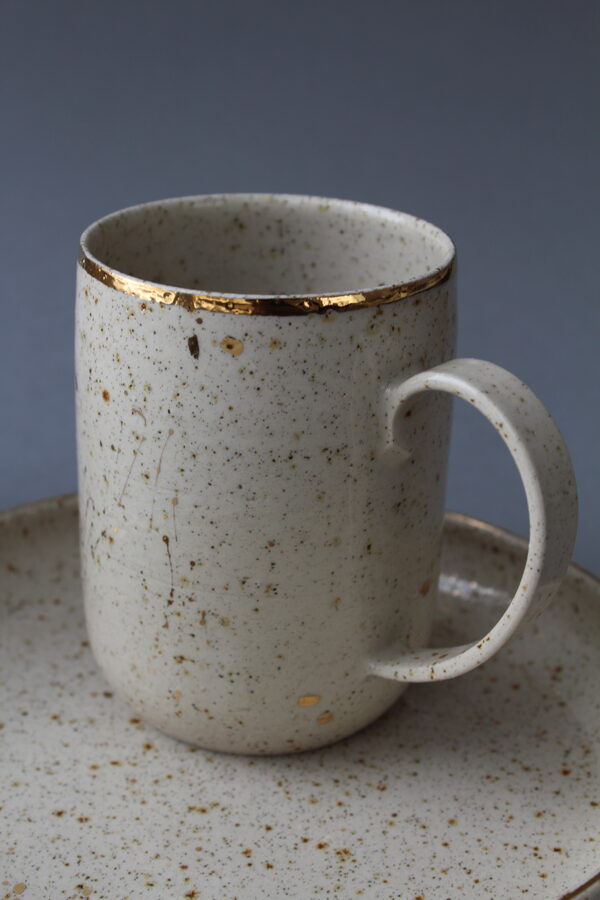 Creamy mottled mug and a plate